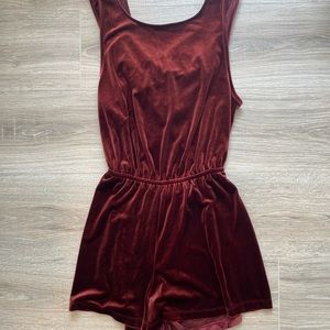 women’s burgundy/maroon velvet romper that’s open in the back!